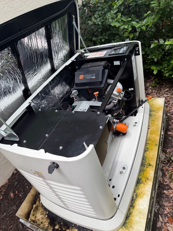 Generac air-cooled standby generator opened for service at a Southwest Florida home